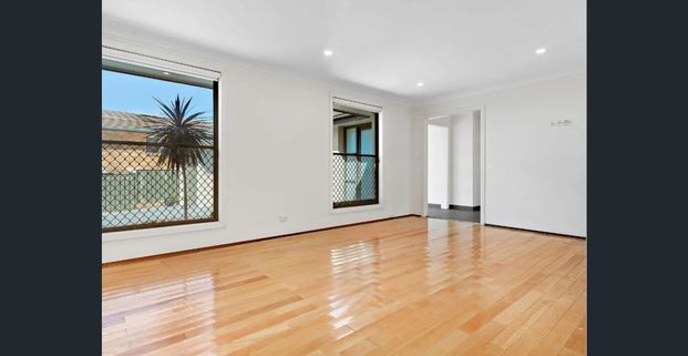 Stunning 4-Bedroom Family Home with Spacious Living - Photo 1