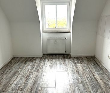 Gemütliche 2 Zimmer Dachgeschoss-Wohnung in Duisburg-Baerl - Photo 4