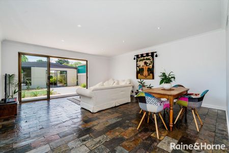 A prime location and a fabulous makeover… a home where the timeless charm of the 1950's meets modern luxury! - Photo 3