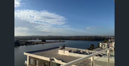 Stunning Water Views Three Bedrooms with 2 Carspace - Photo 4