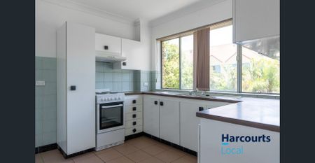 Recently Renovated Two-Bedroom Unit - Photo 3