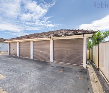 Two bedroom unit with new paint and carpet. - Photo 2