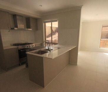 Four Bedroom Family Home with Multiple Living Areas! - Photo 6