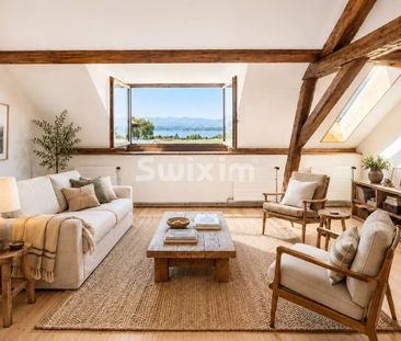 In Anières, a 6.5-room house in a fully renovated former dairy - Photo 1