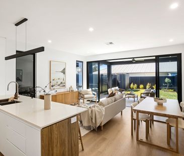 Beachside Living and Modern Convenience 3 Bedroom Home - Photo 3
