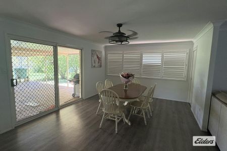 NEW TO THE RENTAL MARKET – SPACIOUS 4-BEDROOM BRICK HOME ON ¾ ACRE - Photo 2