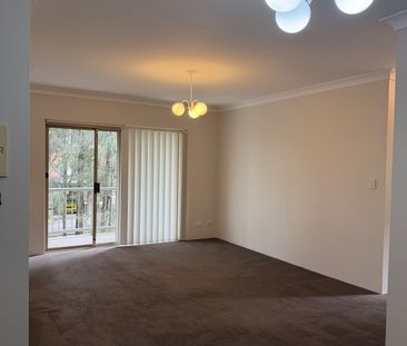 Neat 2 bedroom unit in security block available NOW - Photo 1