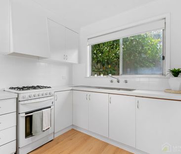 Two Bedroom Renovated Unit - Photo 3