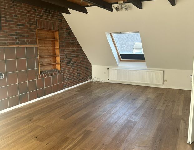 gemütliche Dachgeschosswohnung im Zentrum von Aschendorf - Foto 1