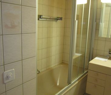 Appartement de 4 pièces au 3ème étage situé au centre du village - Photo 6