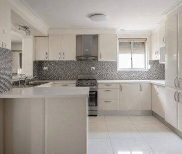 Four Bedroom House in a Convenient Street of Quakers Hill - Photo 5