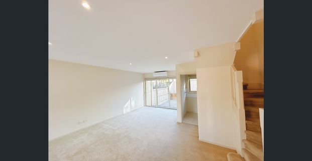 Stylish & Spacious Living in a Prime Location - Photo 1