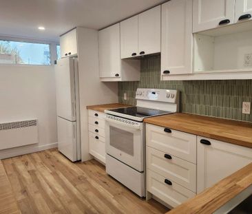 3 1/5 complètement rénové avec électroménagers à Chomedey - Photo 3