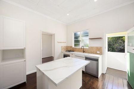 Freshly Renovated Character Home in Sought-After Bardon - Photo 4