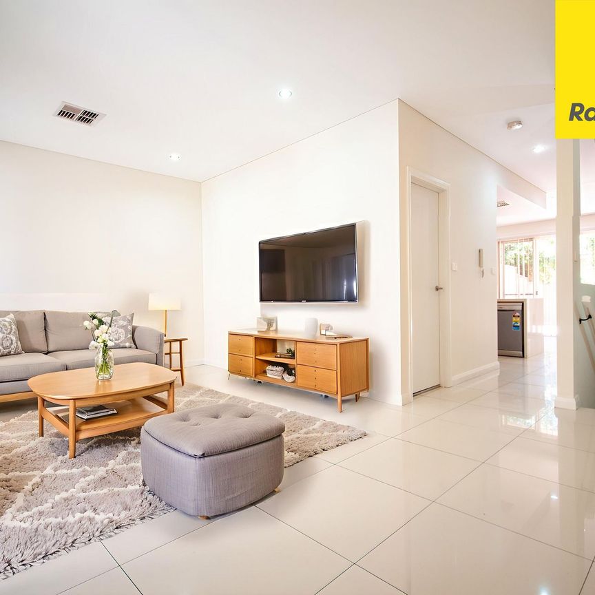 CONTEMPORARY THREE BEDROOM TOWNHOUSE IN MOST SOUGHT AFTER LOCATION - Photo 1