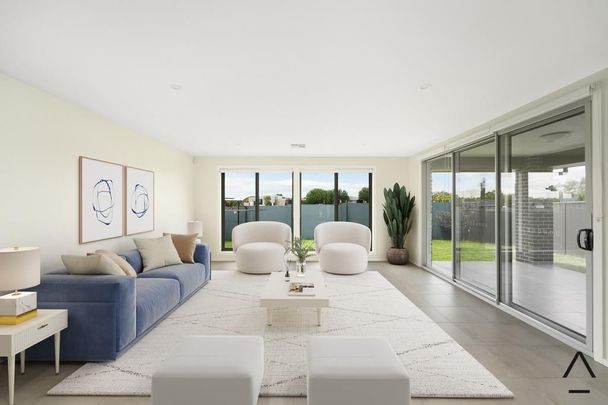 Grand Double-Storey Home in Prime Oran Park Location - Photo 1