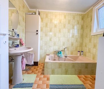 Charmante rustig gelegen woning met ruime tuin en garage! - Photo 4