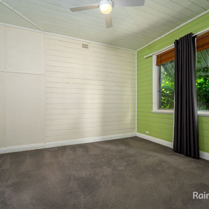 Well-Appointed Home with a Large Flat Backyard in a Central Location - Photo 1