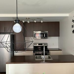 3 1/2 -condo Urbania-1er juin - Photo 2