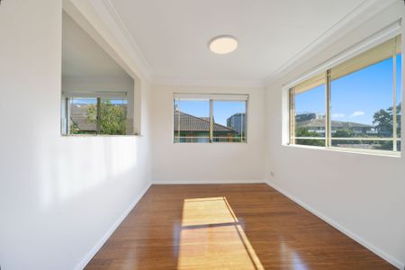 Warm and inviting top floor apartment sure to make you feel right at home - Photo 2