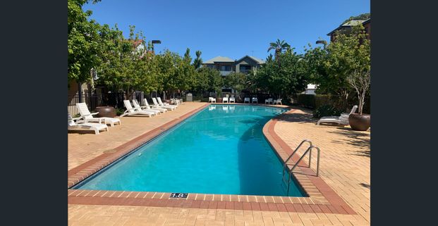 Resort-Style Ground Floor Apartment - Photo 1