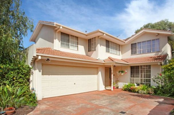 Spacious, Sun-Filled Home with Newly Renovated Kitchen - Photo 1