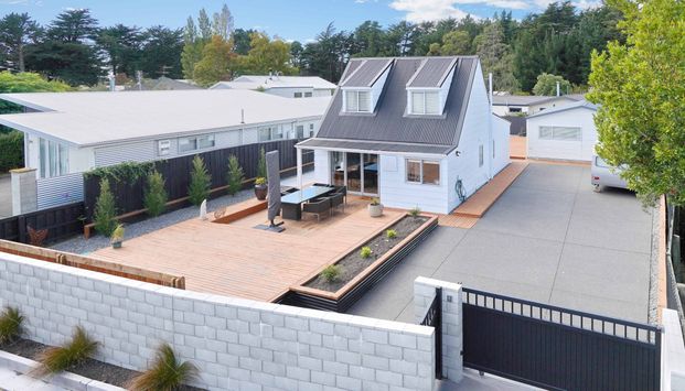 Modern Beachside Living - 3-Bedroom Home in Waikuku Beach - Photo 1