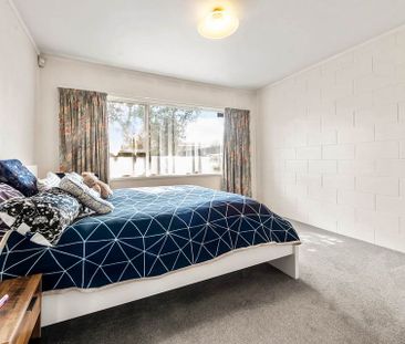 Spacious 2-Bedroom | Great Location & Convenience - Photo 1