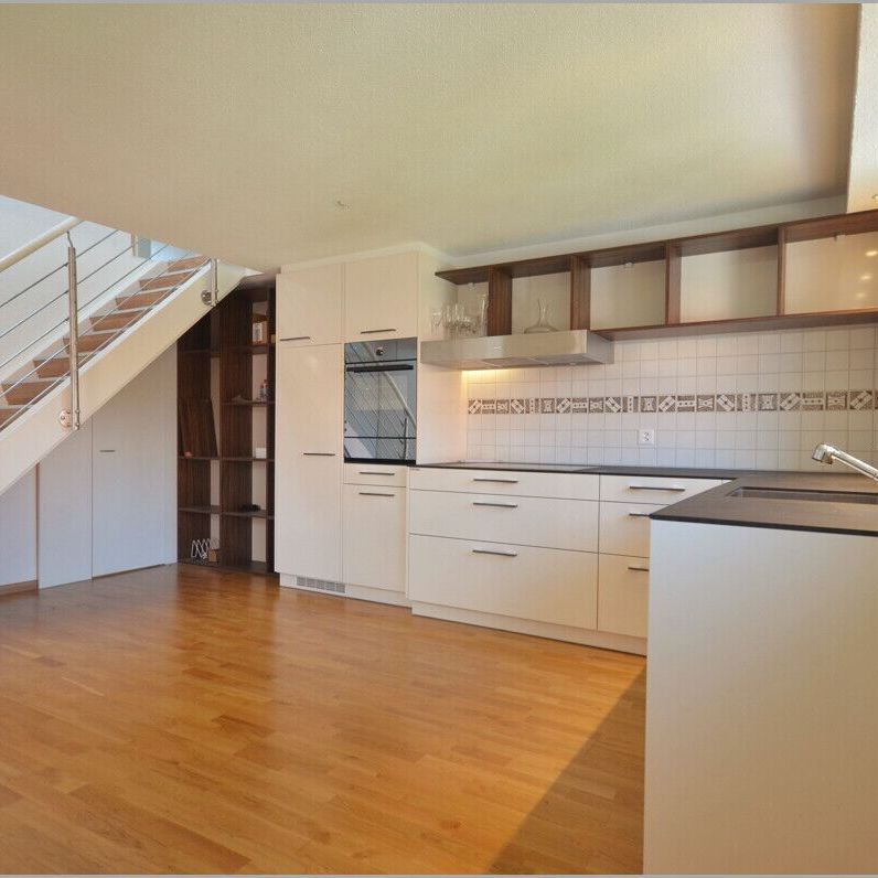 Modern attic maisonette with fantastic views! - Photo 1