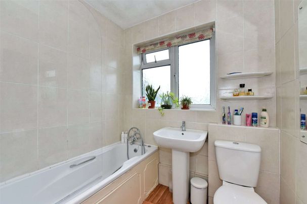 A spacious three bedroom duplex with private garden, garage and allocated parking space - Photo 1