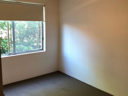 "2 Bedroom Unit with a Large Garage with Room for a Workshop/ Storage" - Photo 2