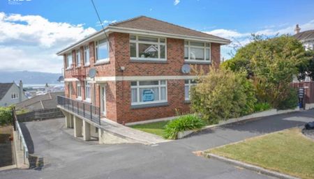 Executive City Living with Deck & City Views - Photo 3