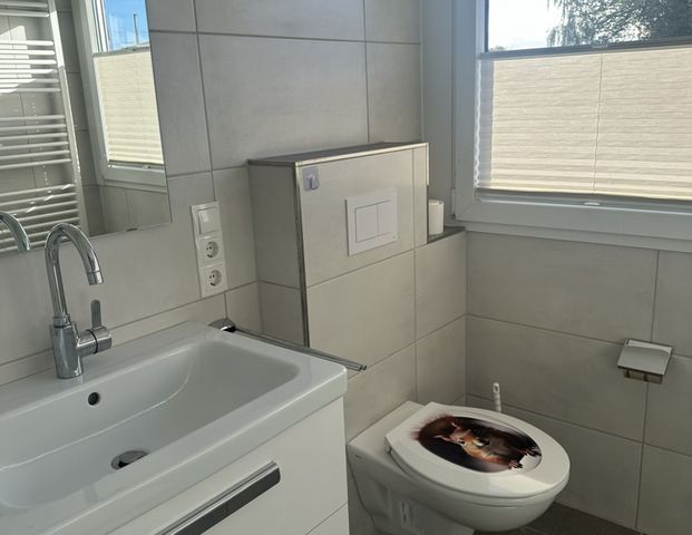 gemütliche Dachgeschosswohnung im Zentrum von Aschendorf - Foto 1