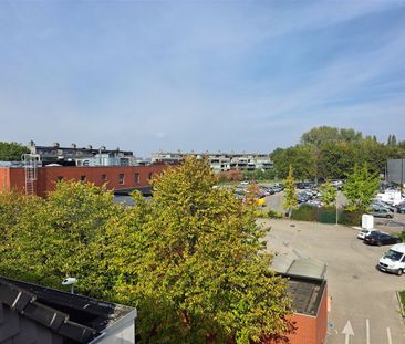 Lichtrijk appartement met 2 terrassen en autostaanplaats - Photo 4