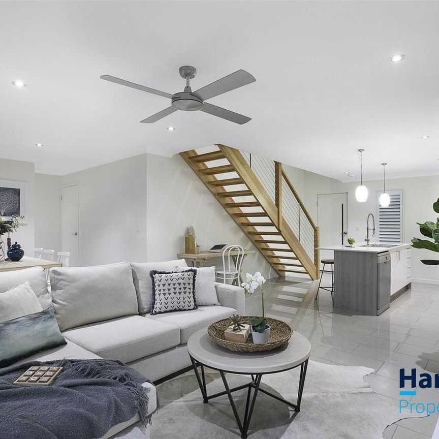 Gorgeous Three Bedroom Townhouse in Prime Location - Photo 1