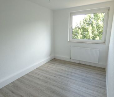 Hervorragende Erdgeschoss-Wohnung mit großem Balkon - Photo 1