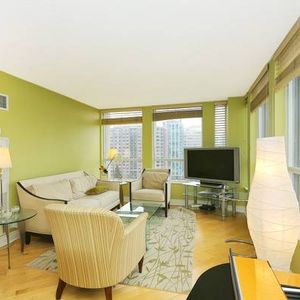 Cheerful 2 Bedroom with 2 Bathrooms plus Balcony and Hardwood Floors - Photo 2