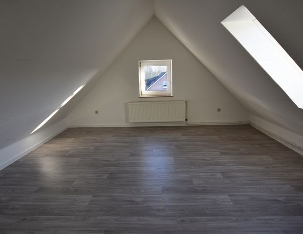 Zentral gelegene Obergeschosswohnung in Warsingsfehn - Foto 1