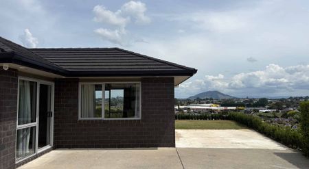 Modern Four-Bedroom Home with Views - Photo 3