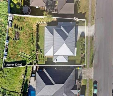 This modern two-level home offers four generous bedrooms, two well-... - Photo 3