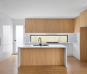 Contemporary Family Living with Dual Master Suites in Fraser Rise - Photo 5