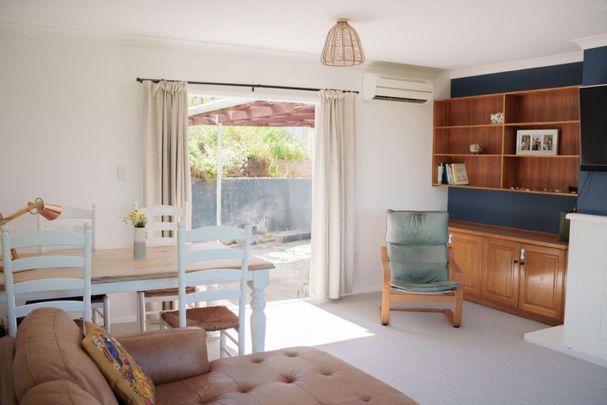 Sunny Elevated Home Near Tahunanui Beach – Privacy, Views and Character - Photo 1