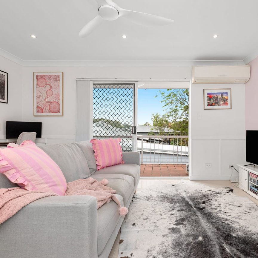 RENOVATED INNER-CITY RETREAT WITH BALCONY & LOCK-UP GARAGE - Photo 1