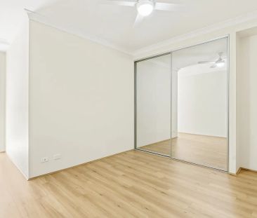 Modern & Fresh: Renovated 2-Bed Unit with Brand New Floating Floors - Photo 1