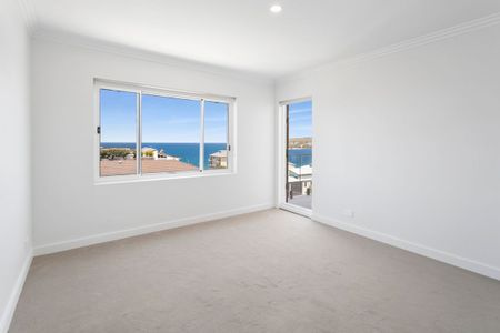 BOUTIQUE FULLY RENOVATED BEACHFRONT APARTMENT WITH PANORAMIC OCEAN VIEWS - Photo 2