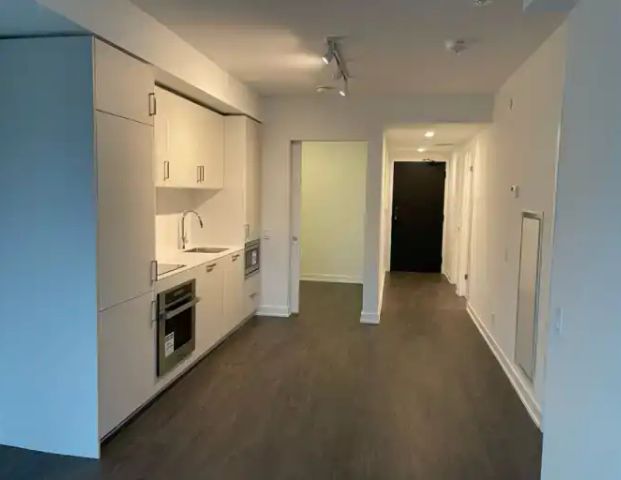 Stunning 1+Den Unit with 2 Washrooms | 88 Queen Street East, Toronto - Photo 1