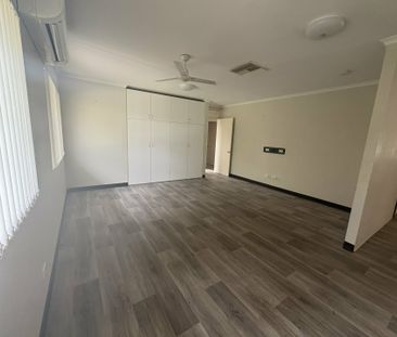 SPACIOUS FOUR BEDROOM, TWO BATHROOM HOUSE WITH 5X CARPORT - Photo 6