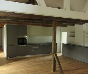 Beautiful 3.5-room apartment with exposed beams - Photo 1