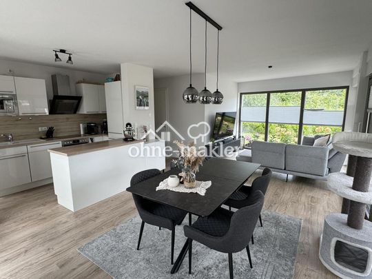 Stilvolle 3-Zimmer-EG-Wohnung mit großer Terrasse und Garten - Photo 1