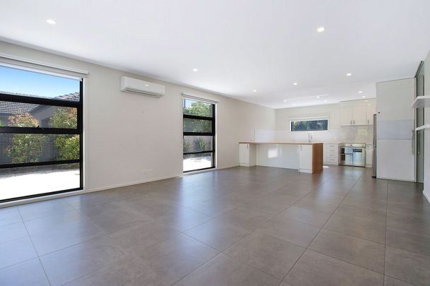 SPACIOUS AND CENTRAL FOUR BEDROOM TOWNHOUSE - Photo 1